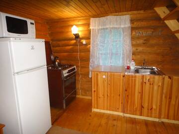 Фото номера Дом с 2 спальнями Дома для отпуска Hunters Rest House Rātnieki г. Nastrova 4