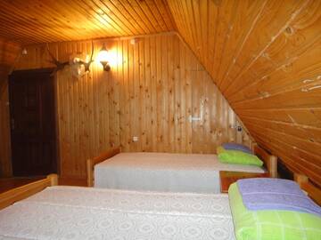 Фото номера Дом с 2 спальнями Дома для отпуска Hunters Rest House Rātnieki г. Nastrova 8